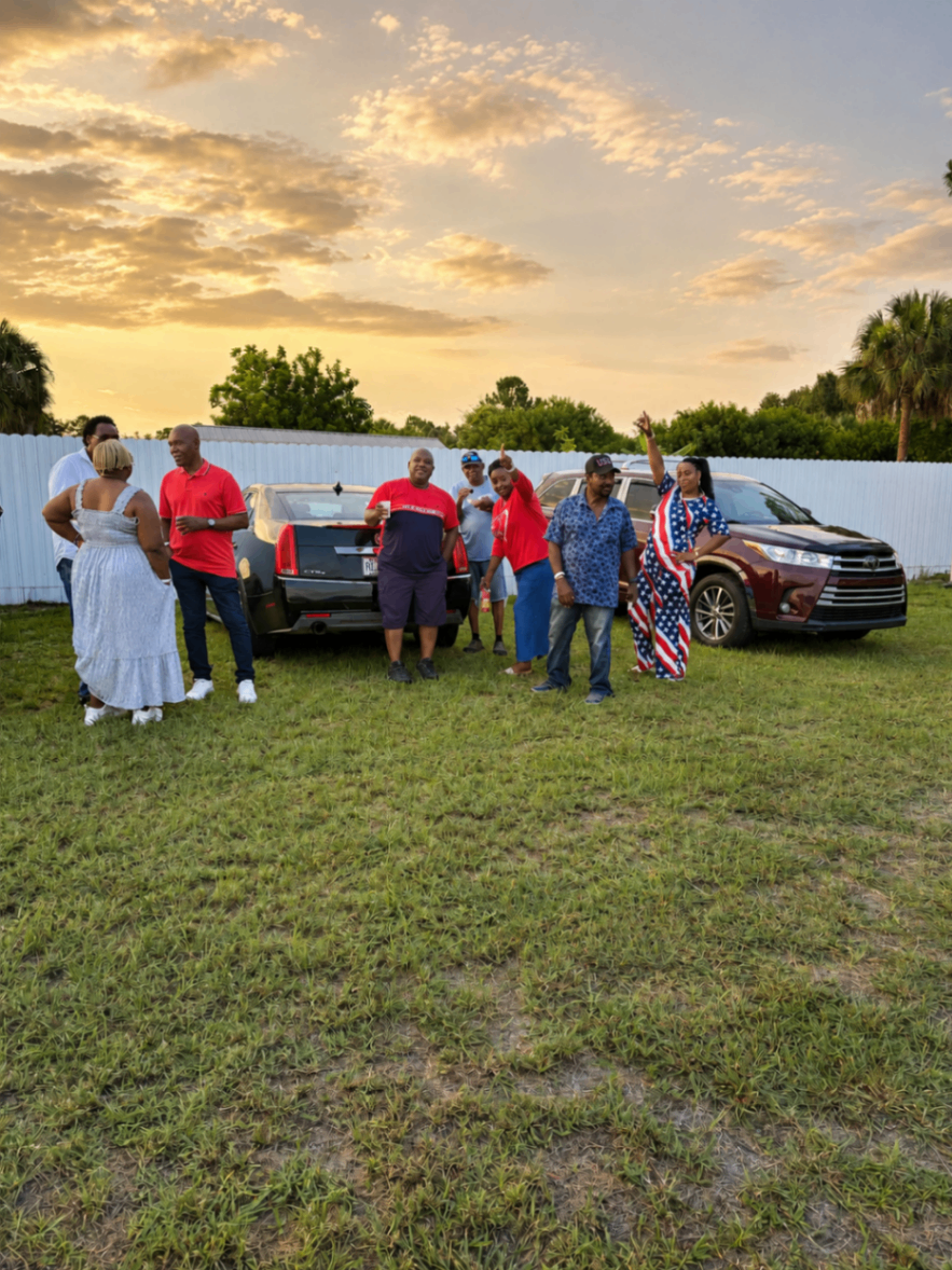 Group gathered at sunset during a club event