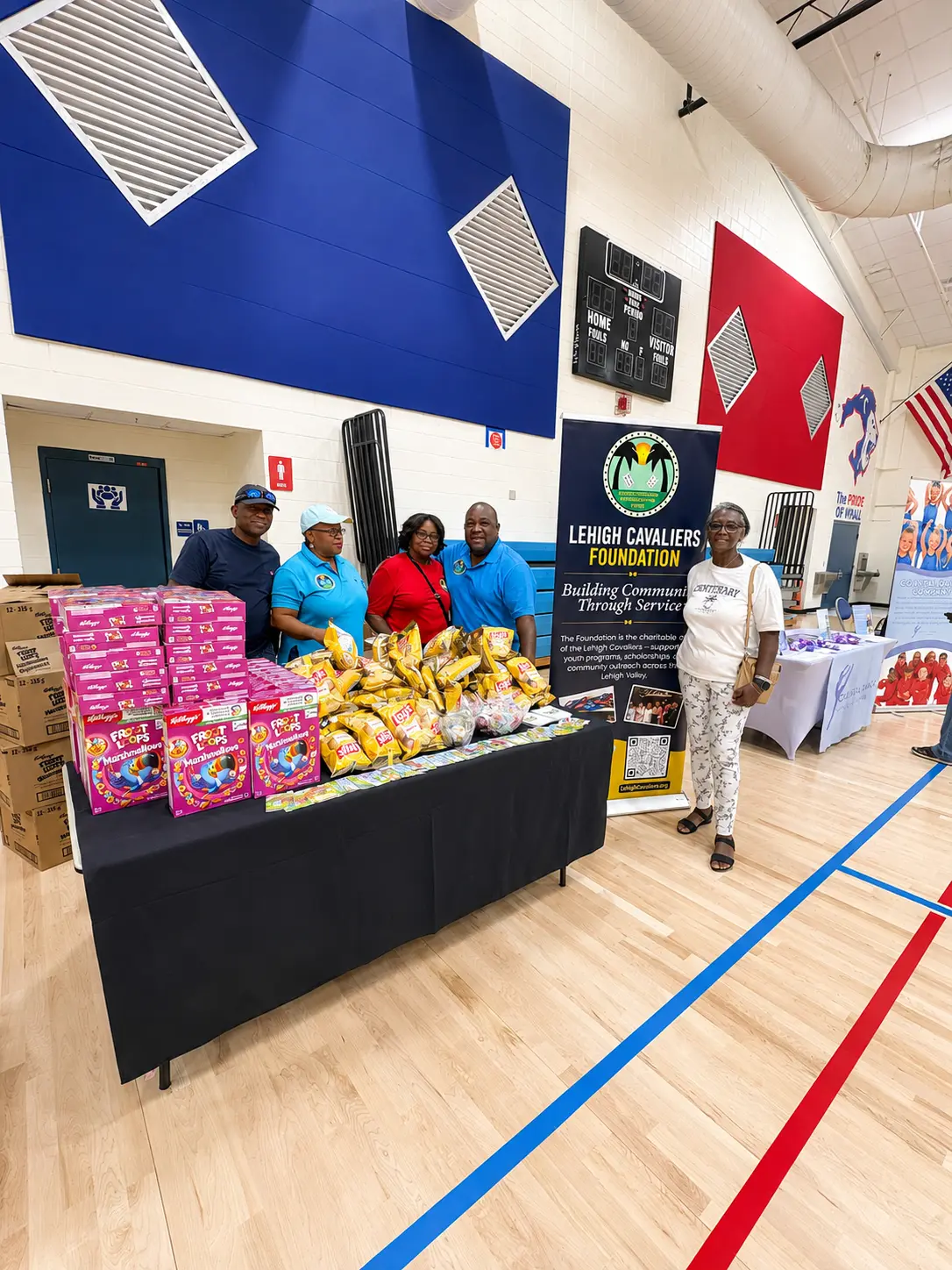 Volunteers at the Lehigh Cavaliers Foundation snack table