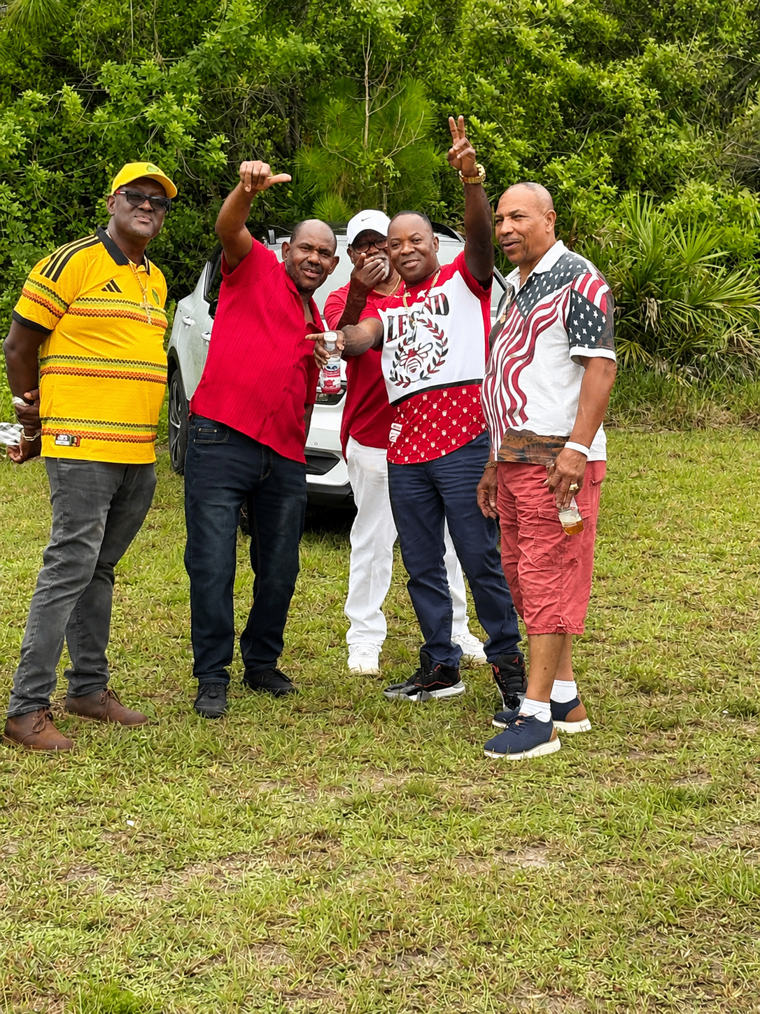 Club members posing outdoors at a gathering