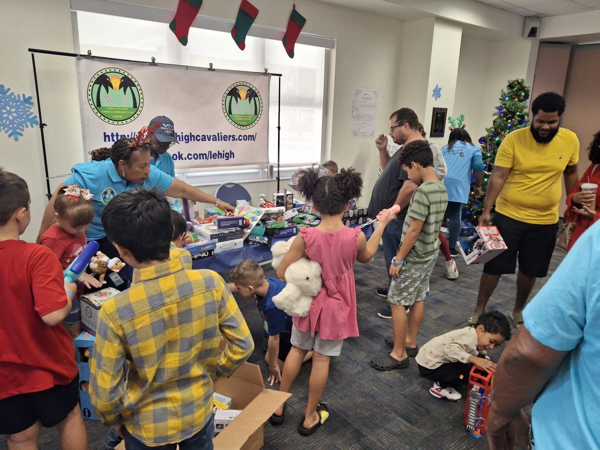 Children selecting toys at the Lehigh Cavaliers community toy drive